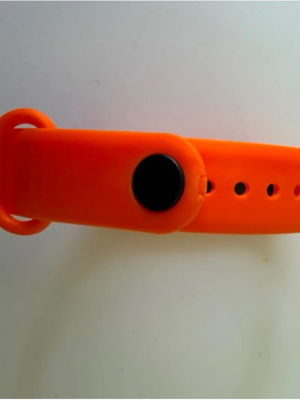 Replaceable Orange Silicone Smartwatch Band with Black Tracker Module